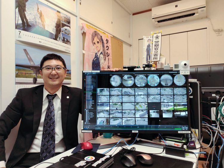 カメラシステムで業務中の熊谷さん